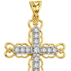 Close detail of the scrolled filigree arms and the set cubic zirconia on a 9ct gold cross pendant