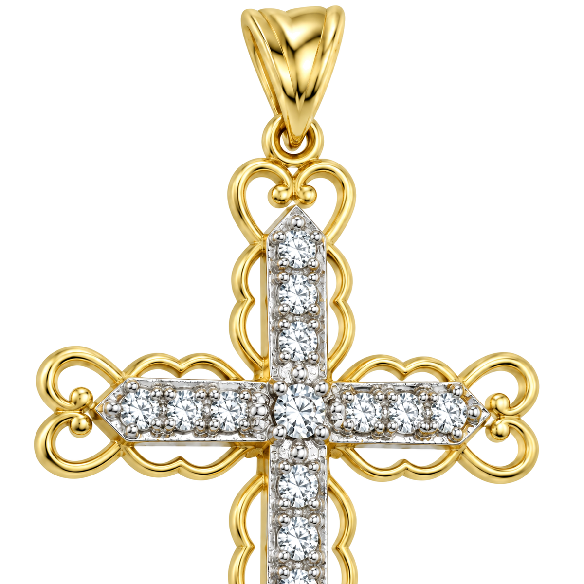 Close detail of the scrolled filigree arms and the set cubic zirconia on a 9ct gold cross pendant