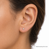9ct gold CZ stud earring worn in the ear, labelled as the 3mm stud