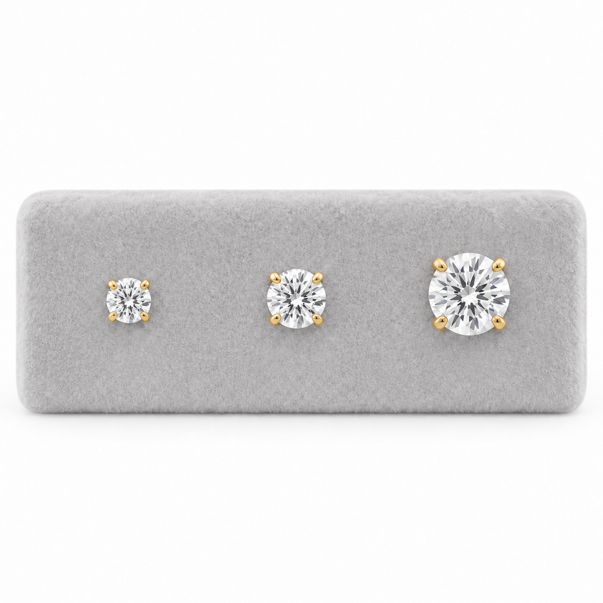 9ct gold CZ stud earrings, 3mm 5mm and 7mm side by side for size
