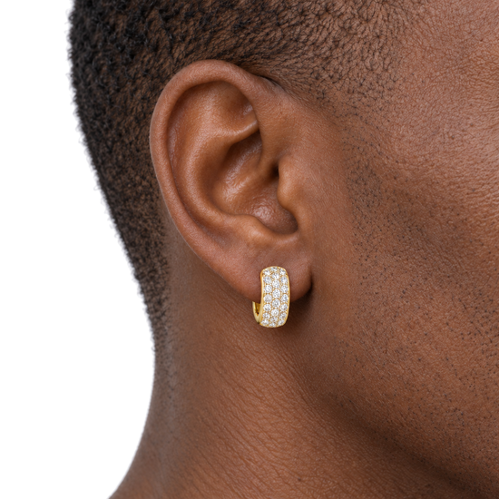 9ct gold three row CZ huggie earring worn in the ear