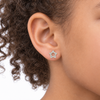 9ct gold CZ open star stud earring worn in the ear